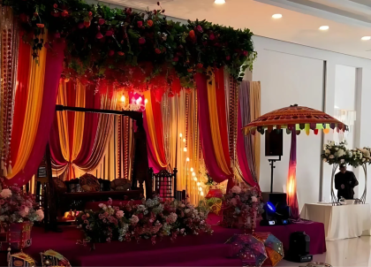 Majestic Mehndi Swing Setup with Elegant Drapes